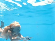 The pool becomes her stage, her movements an aquatic ballet 15/16