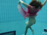 Silvie, a euro teen, showcasing her swimming prowess 3/16