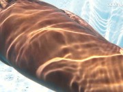 Yorgelis Carrillo, a famous pornstar, glides nude through the water 7/16