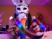 Busty inked babe plays with her rainbow dildo 1/16